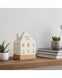 Lichthaus - Teelicht Haus - Dekoration Weihnachten - weiss-glänzend - 17.7 cm auf Ablage neben Büchern und Pflanzen